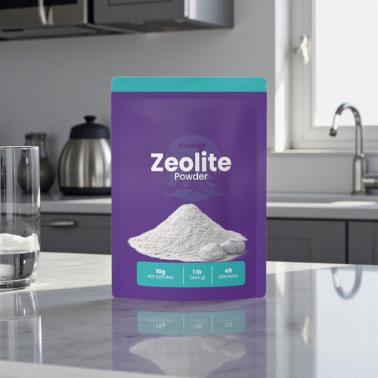 A purple Zeotein Zeolite Powder bag standing on a kitchen counter beside a glass of water