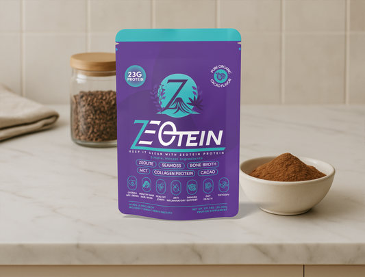 A Zeotein Cacao protein bag on a kitchen counter beside a bowl of cacao powder